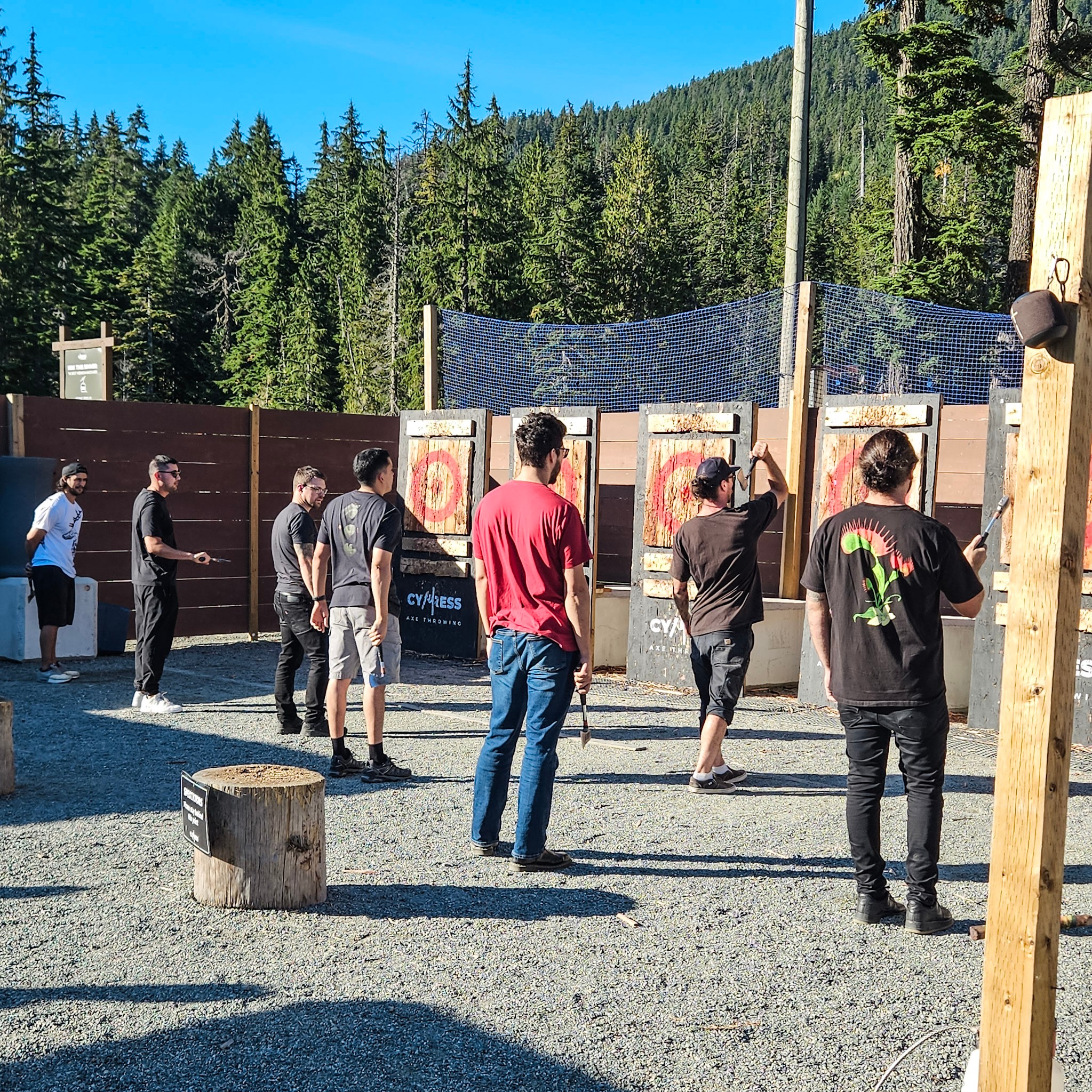 Group teambuilding with axe throwing challenge